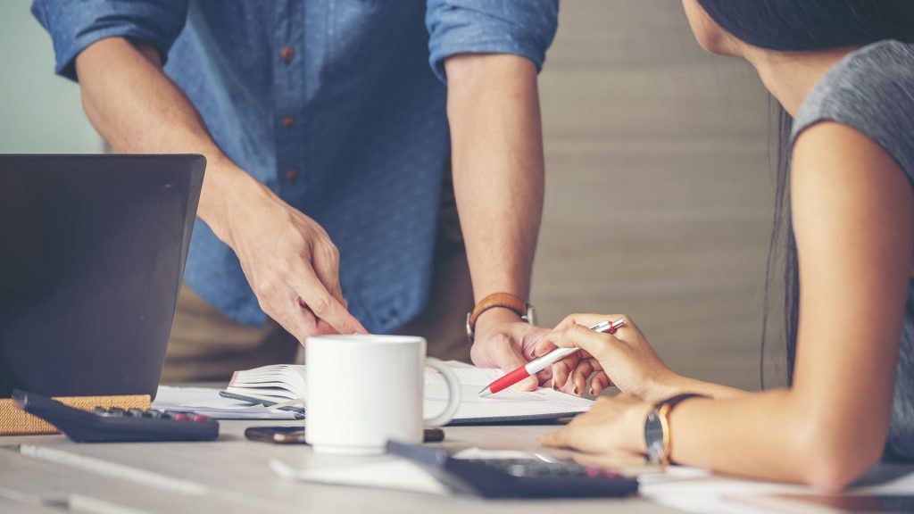 Assertive Communication - People working on a table