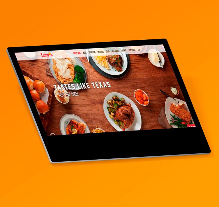 laptop with orange background