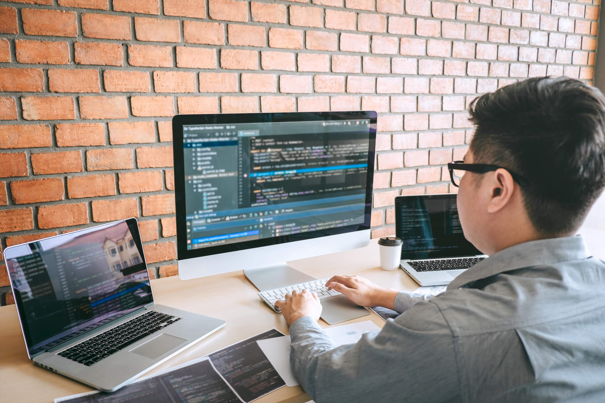 Software developer working on his computer